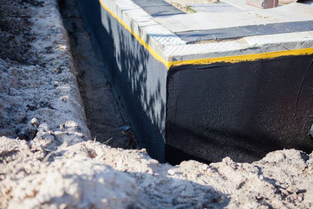 Professional Waterproofing technician working in Charleston, SC